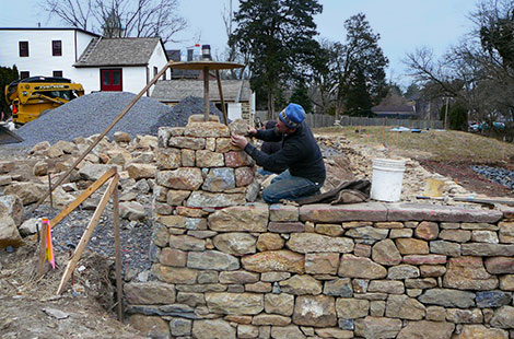 Solid stone wall construction